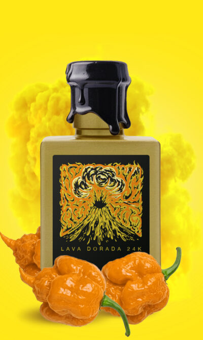 Lava Dorada 24k Gold Hot Sauce luxury bottle with shimmering 24-carat gold flakes, premium Spanish hot sauce in elegant gold packaging