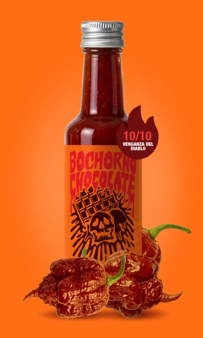 Revolucion del Fuego Chocolate Carolina Reaper hot sauce bottle for churros, crafted with beetroot ginger and cocoa Spain
